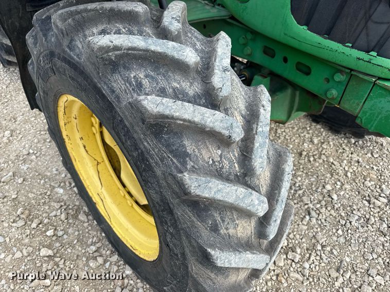 image for item DV4220 2003 John Deere 6430 MFWD tractor