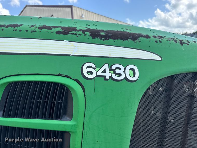 image for item DV4220 2003 John Deere 6430 MFWD tractor
