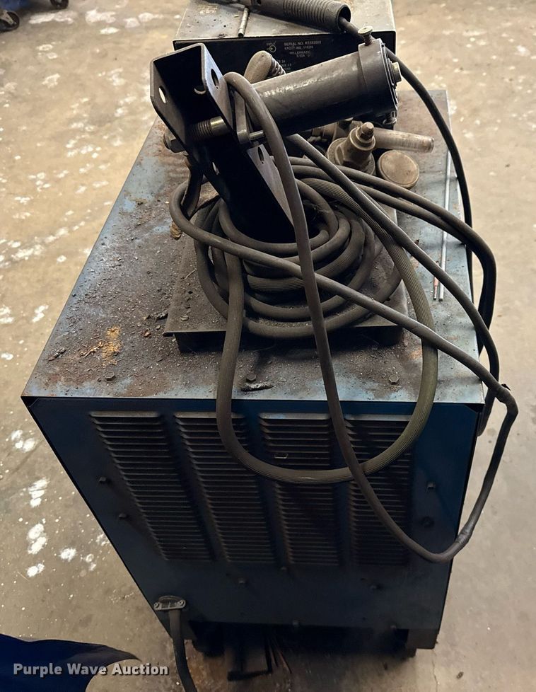 image for item DX5538 (2) Miller Shopmaster 300 AC/DC welder