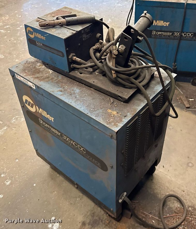 image for item DX5538 (2) Miller Shopmaster 300 AC/DC welder