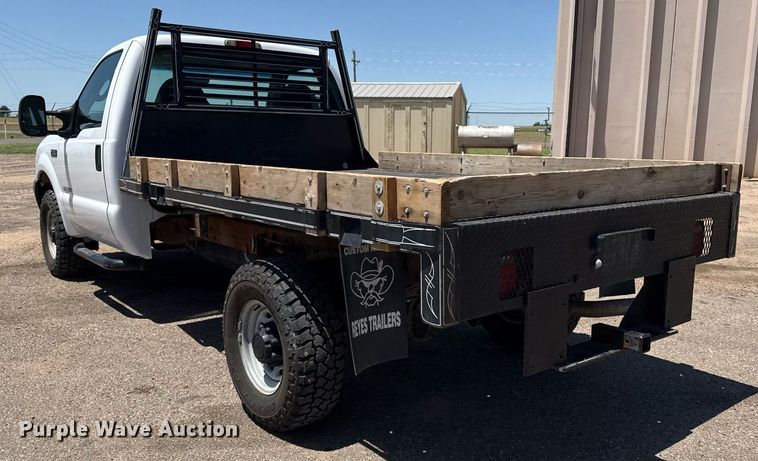 image for item DZ8522 2003 Ford F250 Super Duty flatbed pickup truck