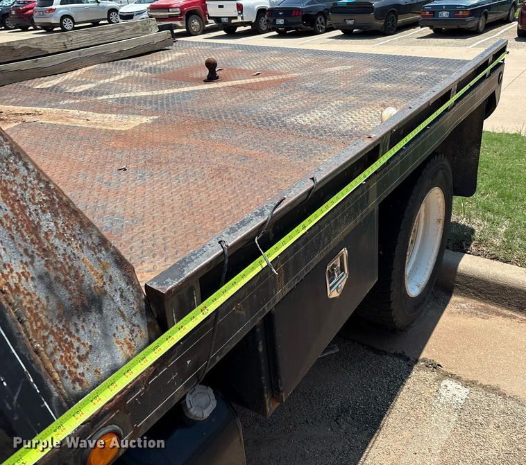 image for item EM2610 2002 International 4700 flatbed truck