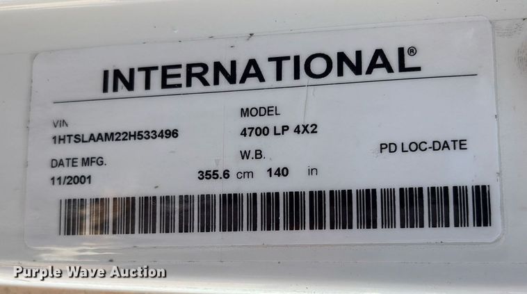 image for item EM2610 2002 International 4700 flatbed truck