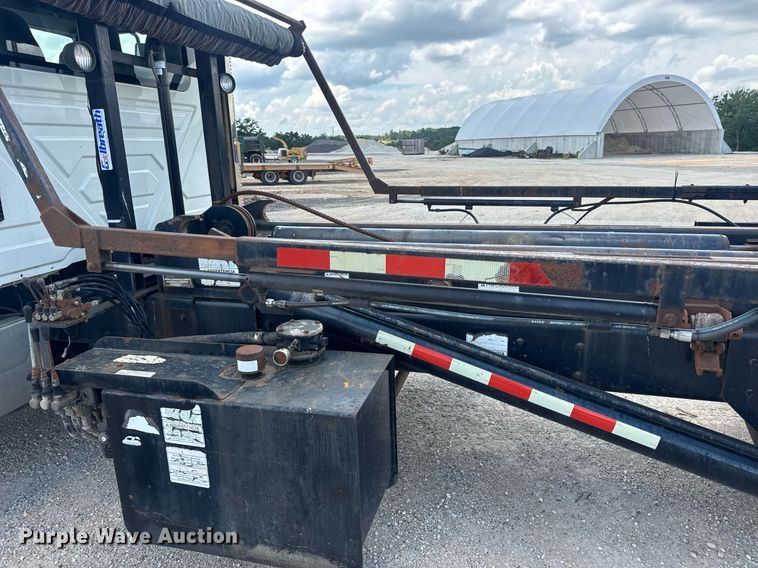 image for item EN4565 2010 International 7400 roll-off container truck