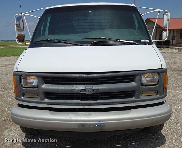 image for item EN8150 1999 Chevrolet Express 3500 dump flatbed pickup truck