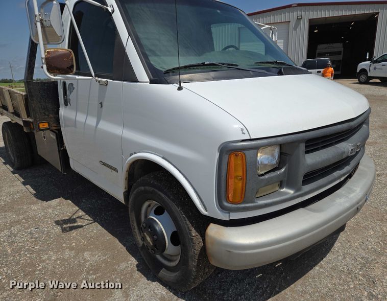 image for item EN8150 1999 Chevrolet Express 3500 dump flatbed pickup truck