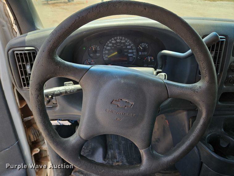 image for item EN8150 1999 Chevrolet Express 3500 dump flatbed pickup truck