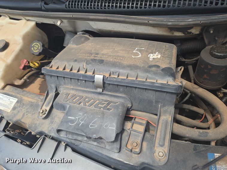 image for item EN8150 1999 Chevrolet Express 3500 dump flatbed pickup truck