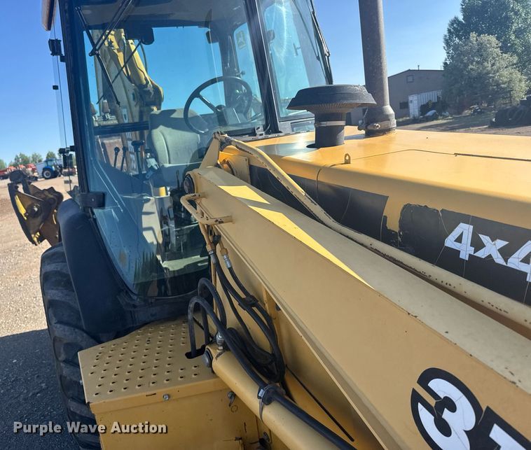 image for item ER2082 1998 John Deere 310E backhoe