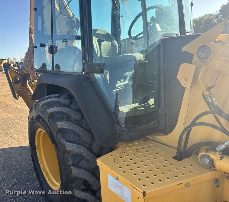 image for item ER2082 1998 John Deere 310E backhoe