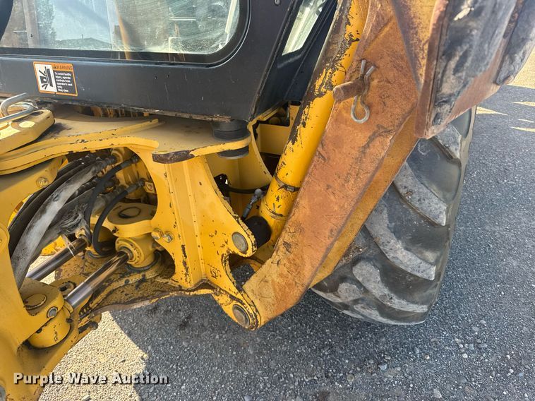 image for item ER2082 1998 John Deere 310E backhoe
