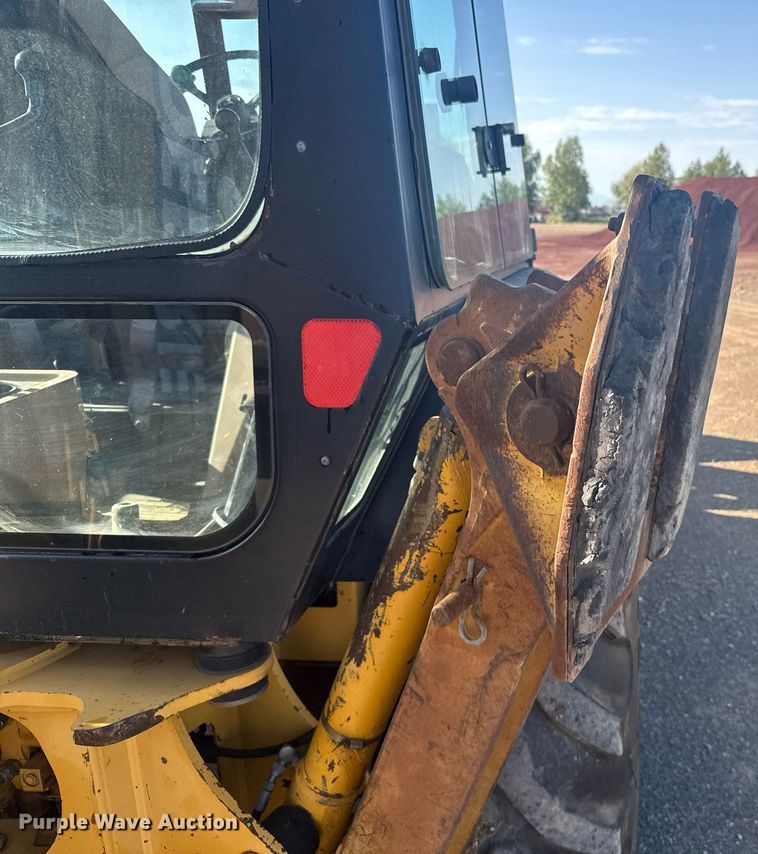 image for item ER2082 1998 John Deere 310E backhoe