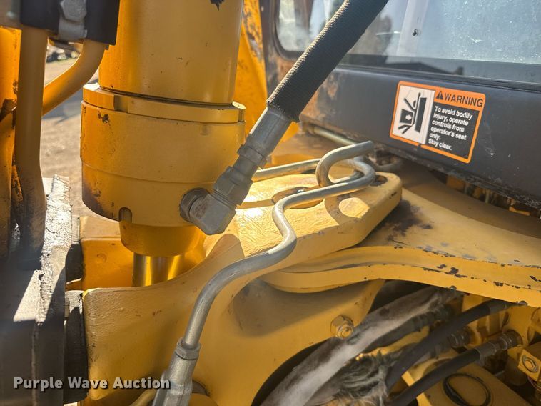 image for item ER2082 1998 John Deere 310E backhoe