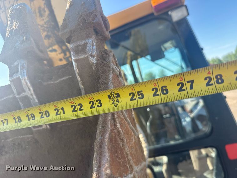 image for item ER2082 1998 John Deere 310E backhoe