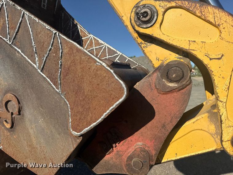 image for item ER2082 1998 John Deere 310E backhoe