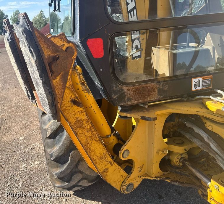 image for item ER2082 1998 John Deere 310E backhoe