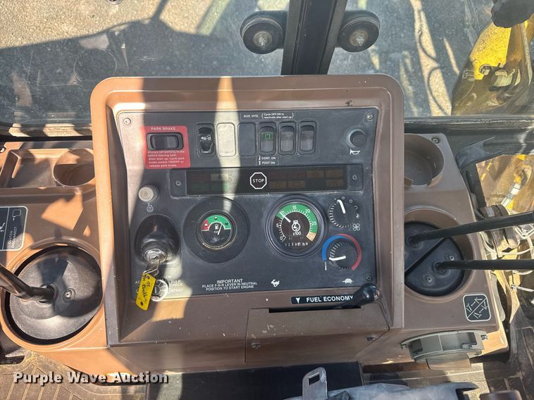 image for item ER2082 1998 John Deere 310E backhoe