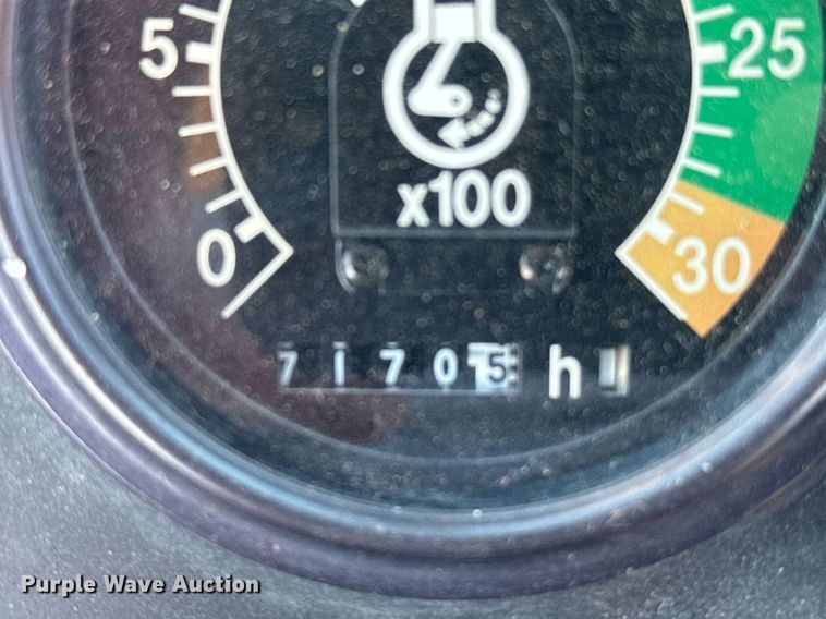 image for item ER2082 1998 John Deere 310E backhoe