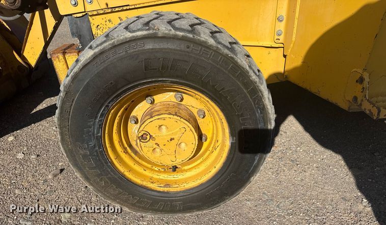 image for item ER2082 1998 John Deere 310E backhoe