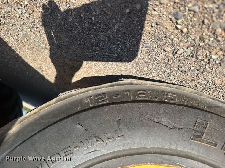 image for item ER2082 1998 John Deere 310E backhoe