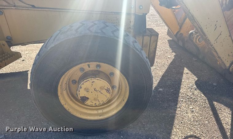 image for item ER2082 1998 John Deere 310E backhoe