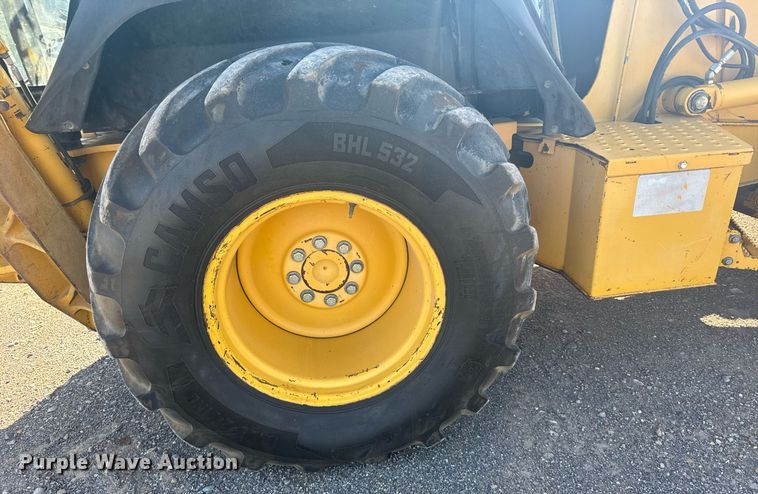 image for item ER2082 1998 John Deere 310E backhoe