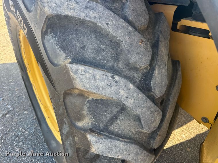 image for item ER2082 1998 John Deere 310E backhoe