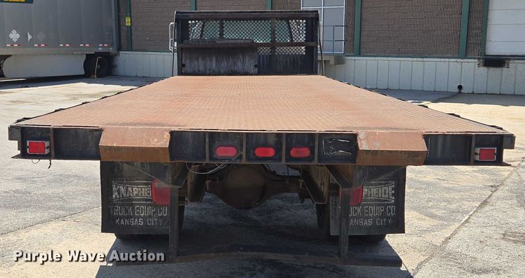 image for item EF1572 1993 Ford F700 flatbed truck
