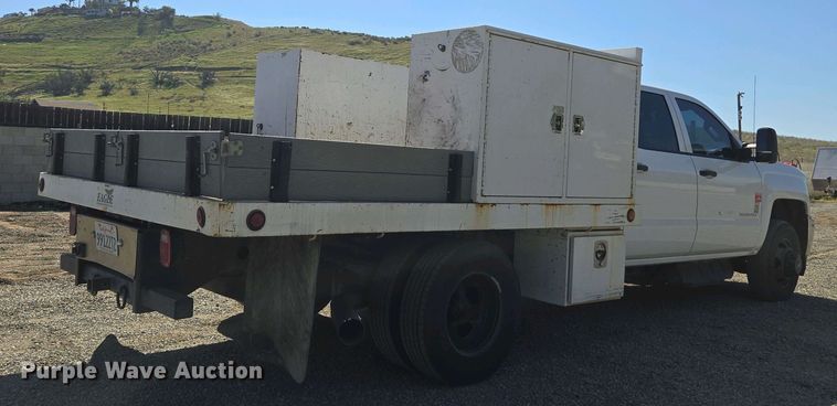 image for item EC0952 2018 Chevrolet Silverado 3500HD Crew Cab flatbed pickup truck