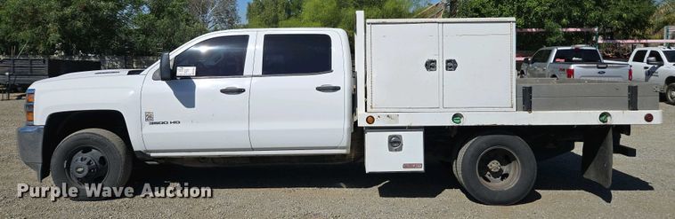 image for item EC0952 2018 Chevrolet Silverado 3500HD Crew Cab flatbed pickup truck