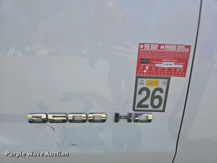 image for item EC0952 2018 Chevrolet Silverado 3500HD Crew Cab flatbed pickup truck