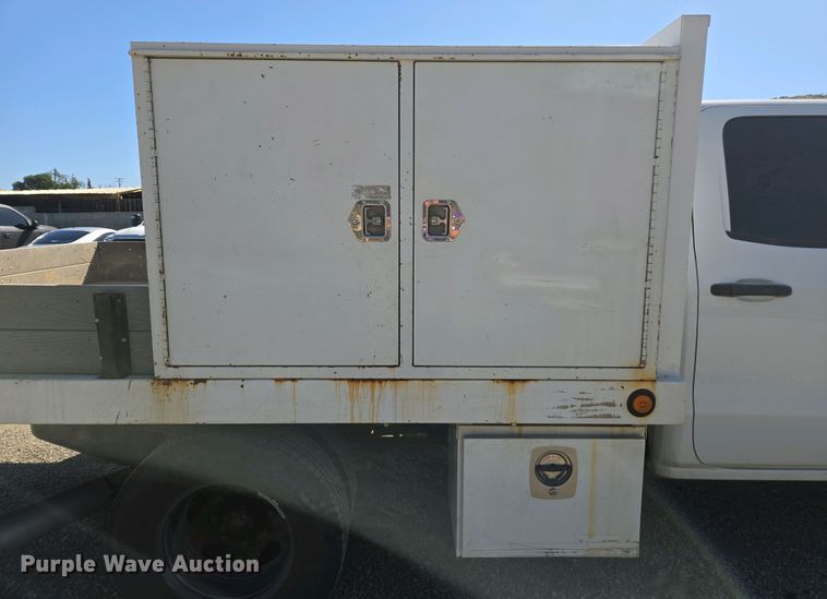 image for item EC0952 2018 Chevrolet Silverado 3500HD Crew Cab flatbed pickup truck