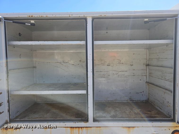 image for item EC0952 2018 Chevrolet Silverado 3500HD Crew Cab flatbed pickup truck