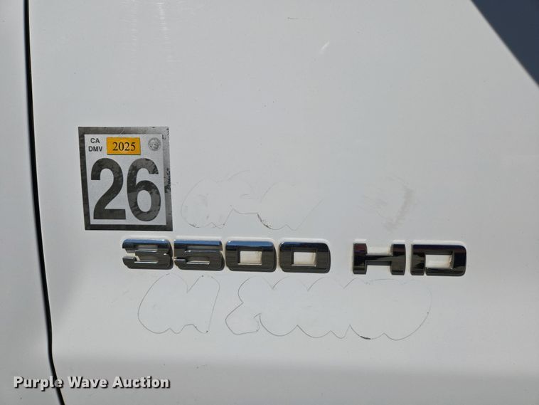 image for item EC0952 2018 Chevrolet Silverado 3500HD Crew Cab flatbed pickup truck