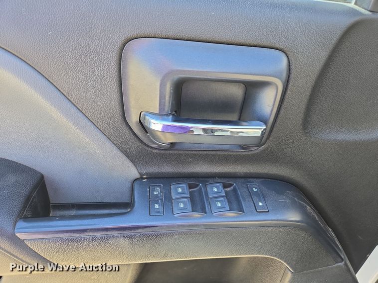 image for item EC0952 2018 Chevrolet Silverado 3500HD Crew Cab flatbed pickup truck