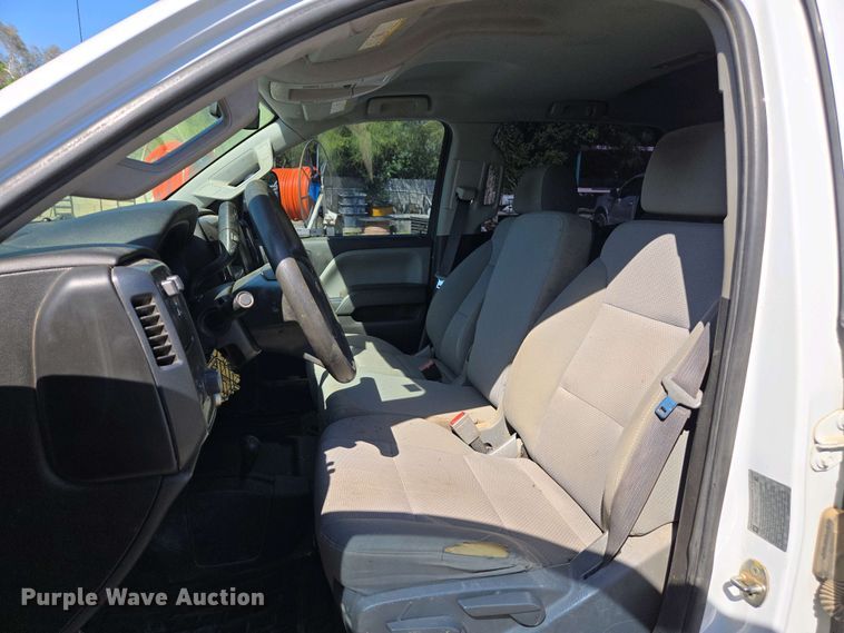 image for item EC0952 2018 Chevrolet Silverado 3500HD Crew Cab flatbed pickup truck