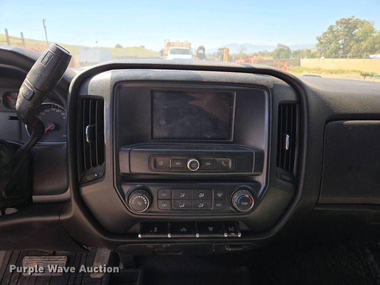 image for item EC0952 2018 Chevrolet Silverado 3500HD Crew Cab flatbed pickup truck