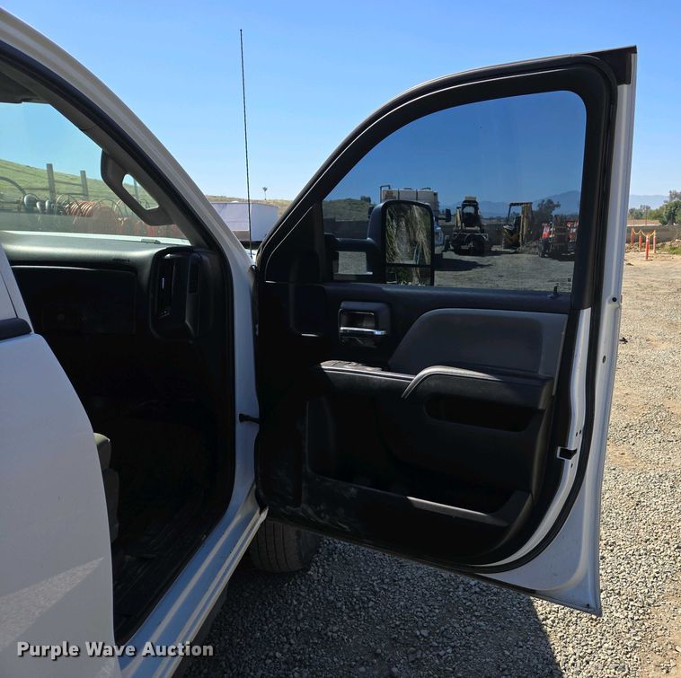 image for item EC0952 2018 Chevrolet Silverado 3500HD Crew Cab flatbed pickup truck