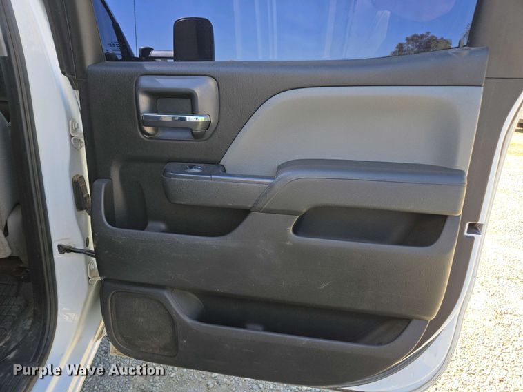 image for item EC0952 2018 Chevrolet Silverado 3500HD Crew Cab flatbed pickup truck