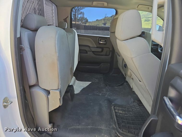 image for item EC0952 2018 Chevrolet Silverado 3500HD Crew Cab flatbed pickup truck