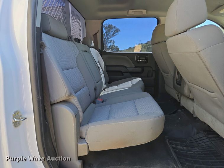 image for item EC0952 2018 Chevrolet Silverado 3500HD Crew Cab flatbed pickup truck