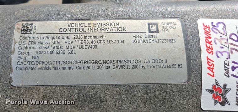 image for item EC0952 2018 Chevrolet Silverado 3500HD Crew Cab flatbed pickup truck