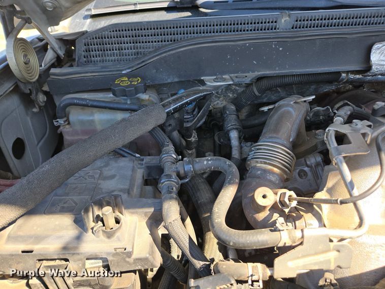 image for item EC0952 2018 Chevrolet Silverado 3500HD Crew Cab flatbed pickup truck