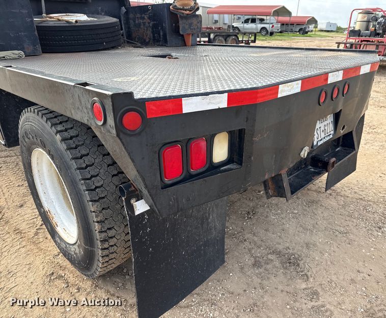 image for item ED5741 2011 Ford F650 Super Duty XL flatbed truck