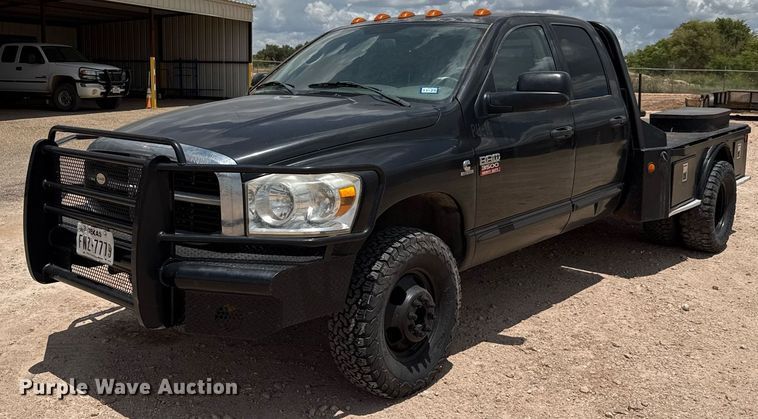 image for item ED5752 2007 Dodge Ram 3500 Quad Cab flatbed pickup truck
