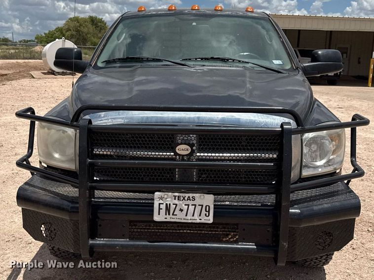 image for item ED5752 2007 Dodge Ram 3500 Quad Cab flatbed pickup truck