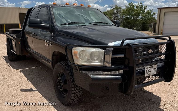 image for item ED5752 2007 Dodge Ram 3500 Quad Cab flatbed pickup truck