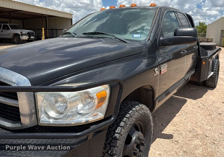 image for item ED5752 2007 Dodge Ram 3500 Quad Cab flatbed pickup truck