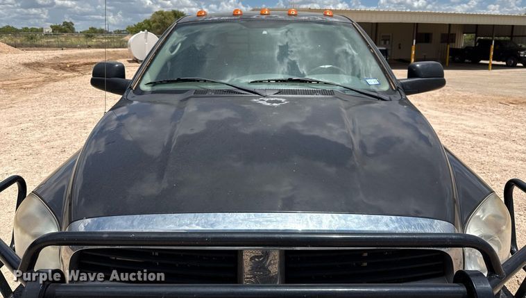 image for item ED5752 2007 Dodge Ram 3500 Quad Cab flatbed pickup truck