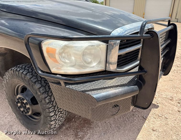image for item ED5752 2007 Dodge Ram 3500 Quad Cab flatbed pickup truck